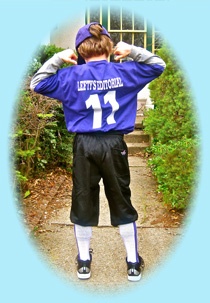 boy in baseball uniform